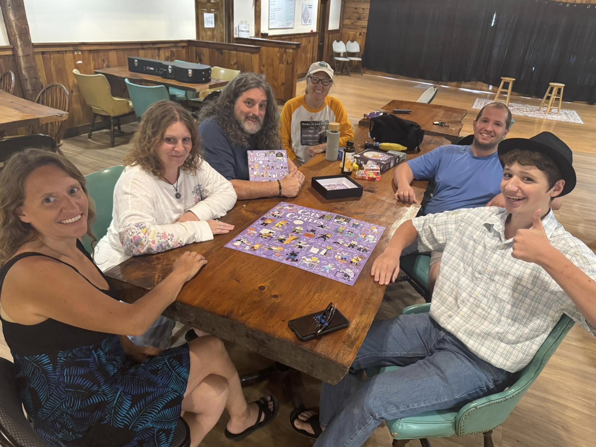 Free Staters playing a board game at the Pine clubhouse in Lancaster